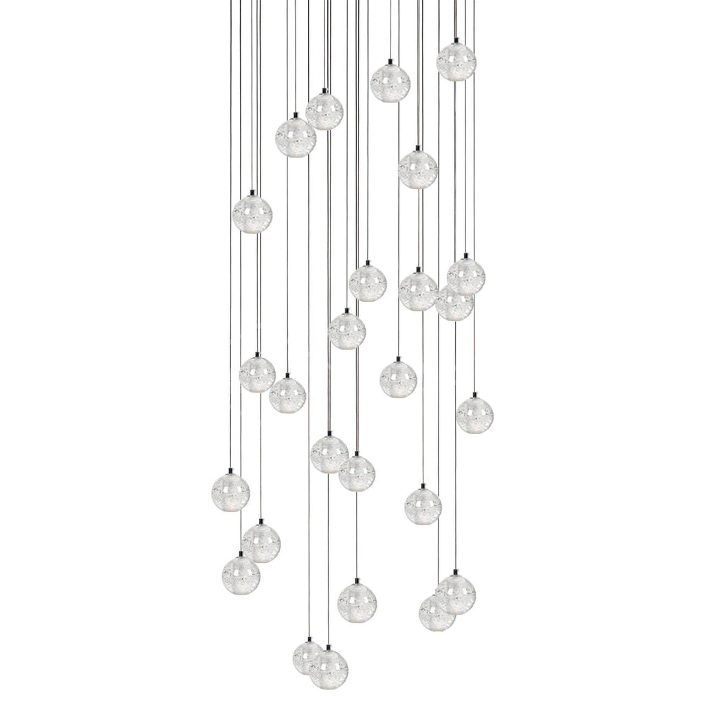 A tall, dense drop of Clérachic crystal ball pendants, with many clear spheres on cables of varied lengths, on white.
