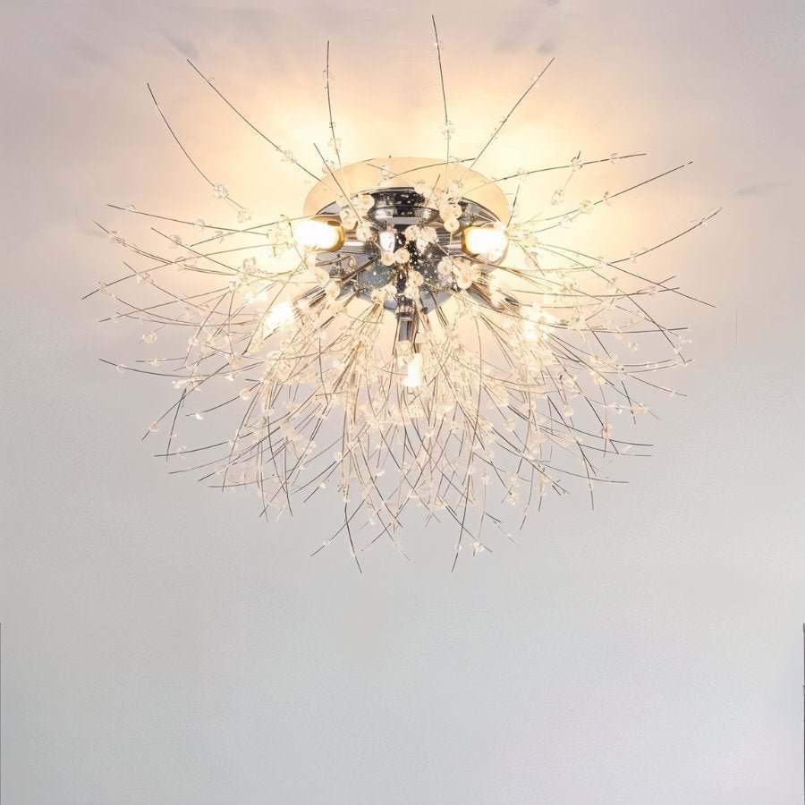 Clérachic silver crystal flush ceiling light seen close, with a chrome canopy, bare bulbs and long beaded rods.