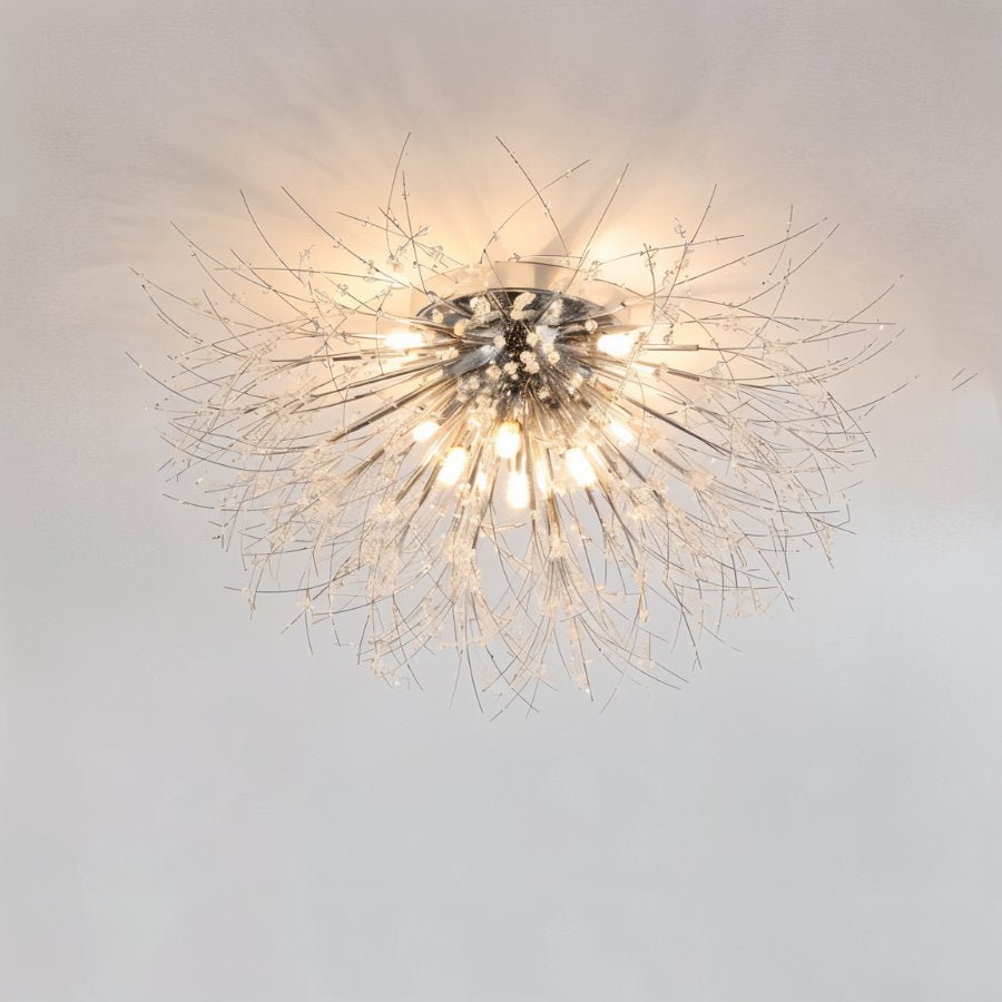 Clérachic silver crystal flush ceiling light on a pale ceiling, a wide spray of fine rods around bright bare bulbs.