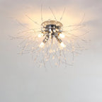 Clérachic four-head silver crystal flush ceiling light with a chrome canopy and sparse beaded rods, lit warm.