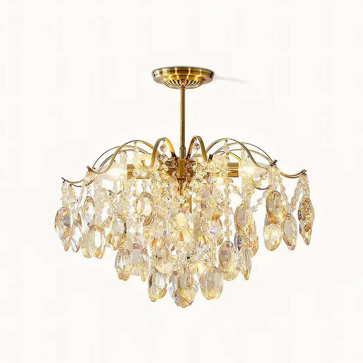 Gold-finished chandelier with amber and clear teardrop crystals, shown on a plain white backdrop as this Clérachic crystal chandelier.