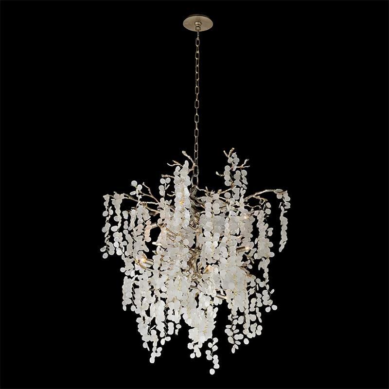 Clérachic round chandelier on black, showing its branching frame and the cascading frosted crystal discs from a slim chain.