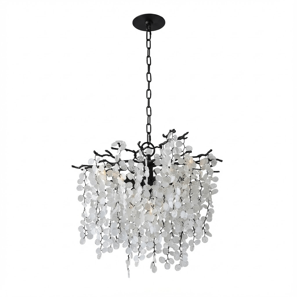 A round Clérachic chandelier in black, with a black chain and canopy, on a plain white backdrop.