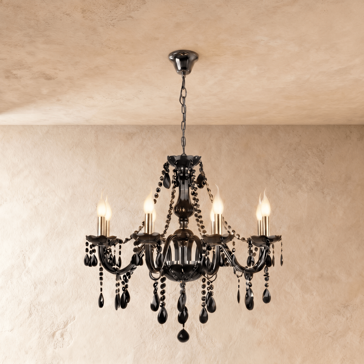 A wider Clérachic chandelier in black glass, its six candle arms lit against a plaster ceiling.