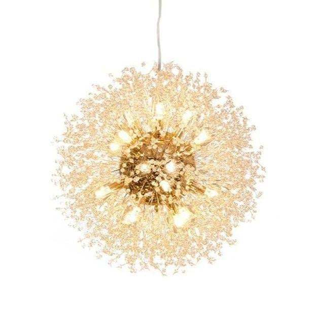 Close, top-down view of this Clérachic chandelier's gold centre hub, its bulbs lit among dense crystal-tipped branches.