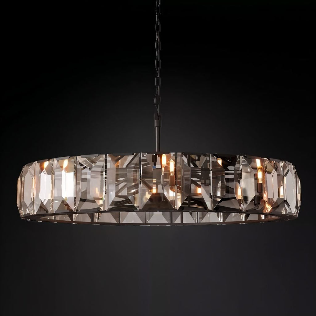 Clérachic blackened-metal ring chandelier with smoky faceted crystal panes and warm bulbs glowing against a black backdrop.