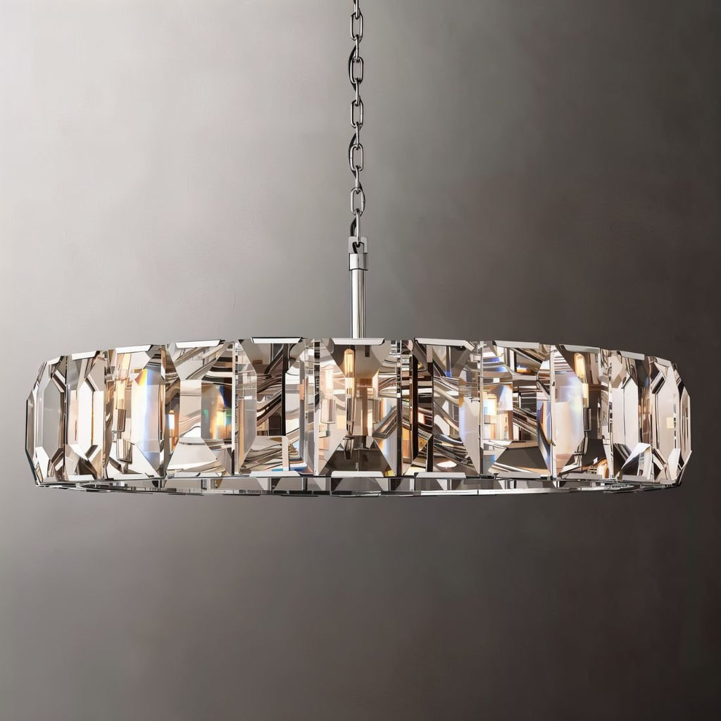 Clérachic polished steel ring chandelier of tall faceted crystal panes, steel chain and rod, shown on a grey backdrop.