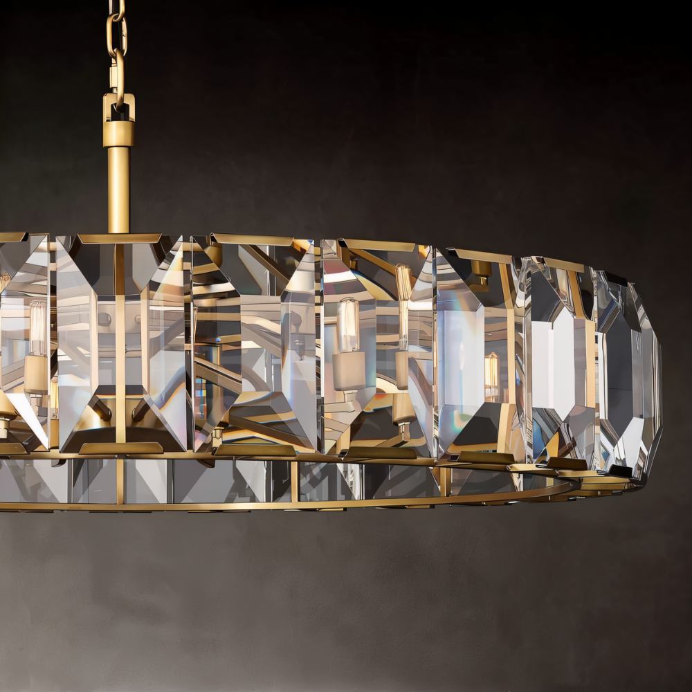 Close crop of the Clérachic brass ring chandelier showing the chain, rod joint and bevelled crystal panes with candle-style bulbs.