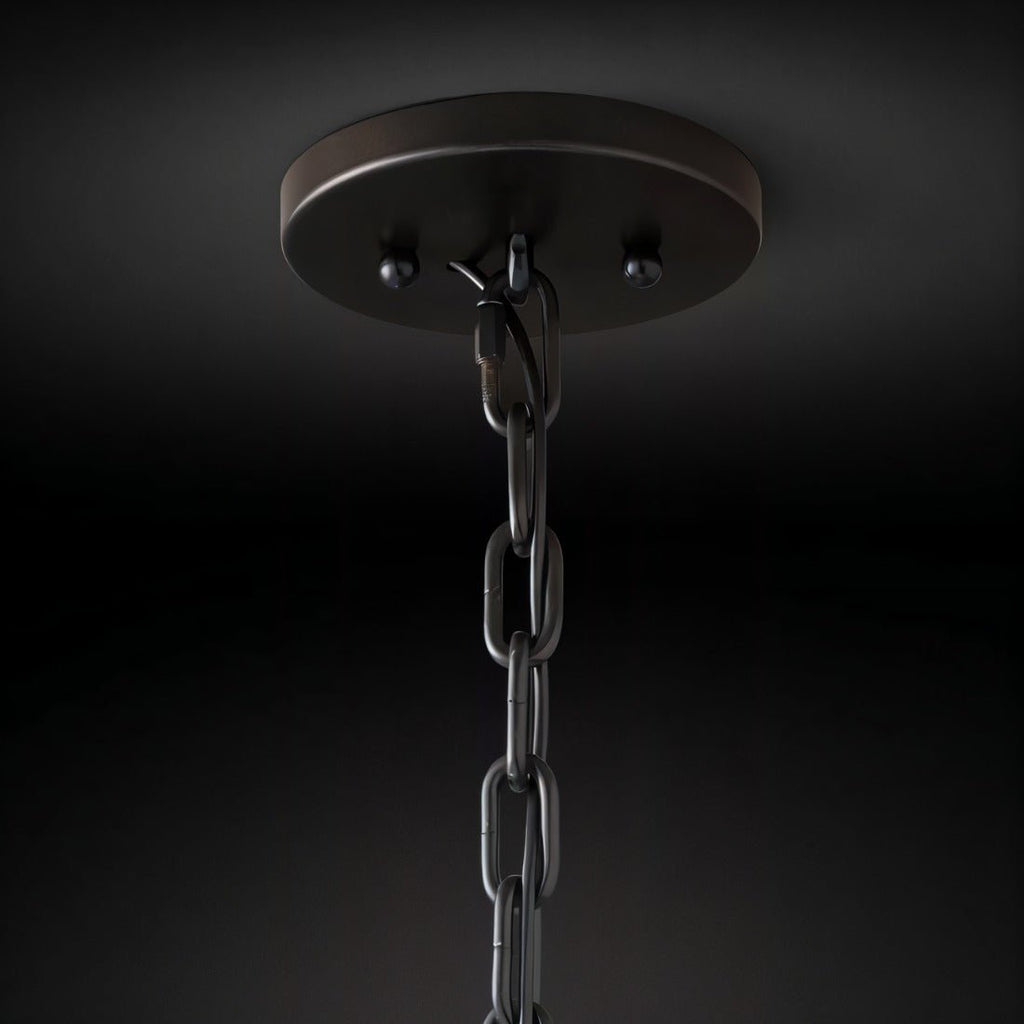 Clérachic matte black ceiling canopy with a chain link and hook, seen from below against a dark backdrop.