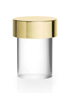 Straight-on view of the gold-capped Clérachic lamp on white, showing the wide metal cap and the plain clear glass below it.