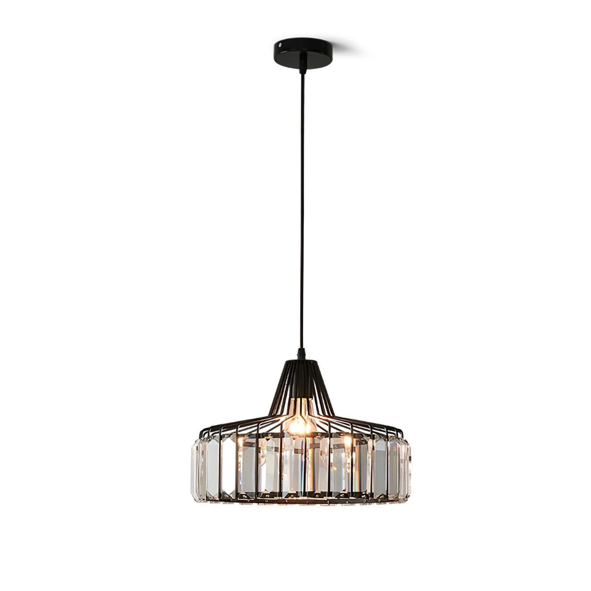 Black crystal drum pendant from Clérachic on a black ceiling plate, lit, hanging on a long cable against a white backdrop.