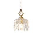 A second plain-white studio view of this Clérachic pendant light, the glass dome, crystal fringe and gold hanger on a twisted cord.