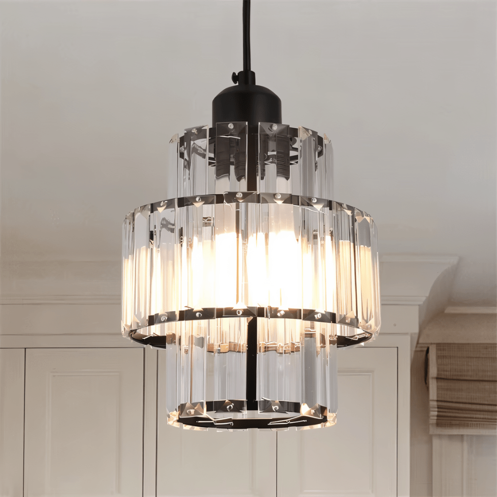 Close view of a Clérachic crystal pendant with a black frame, its three tiers of glass bars glowing from within.