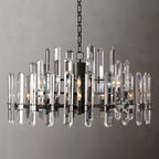 Clérachic wider two-tier chandelier of clear crystal rods on a matte black frame, with candle-style bulbs on a grey ground.