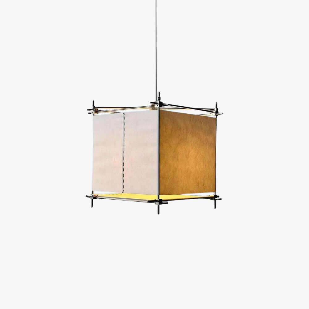 Cube paper lantern pendant from Clérachic with a slim dark metal frame and a glowing base, hung on a thin cord on white.