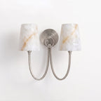 Two-light nickel sconce from Clérachic with alabaster shades marked by warm veins and two curved metal arms.