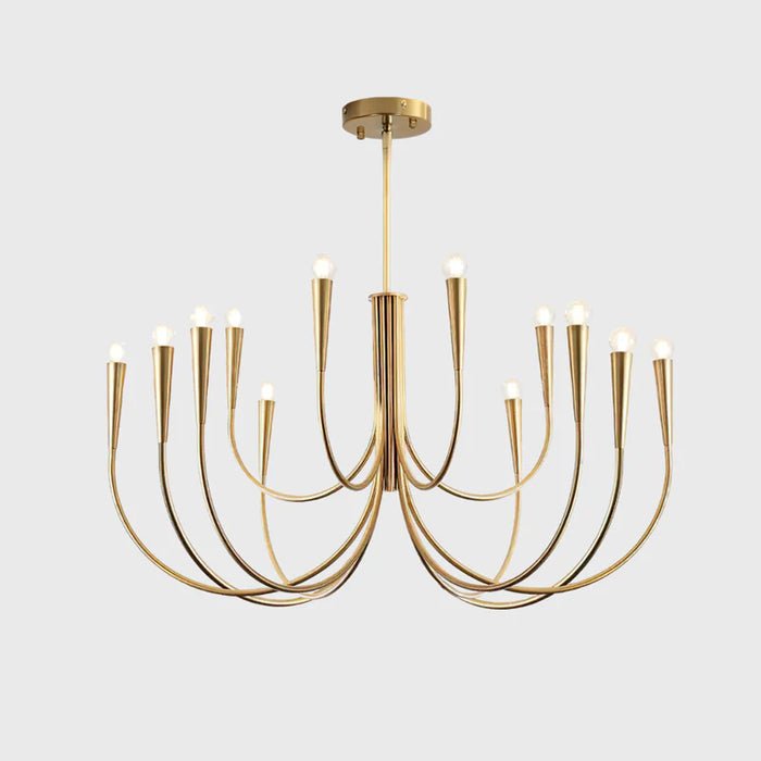 This Clérachic chandelier in a brass tone, cut out on a pale backdrop, with a wide spread of sweeping arms and a round ceiling plate.