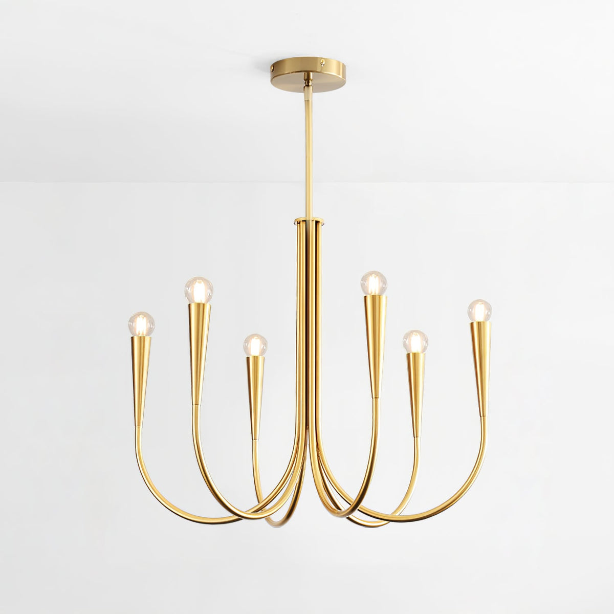 Brass-toned Clérachic chandelier with six curved arms and conical sockets, cut out on a pale backdrop with a slim rod and canopy.