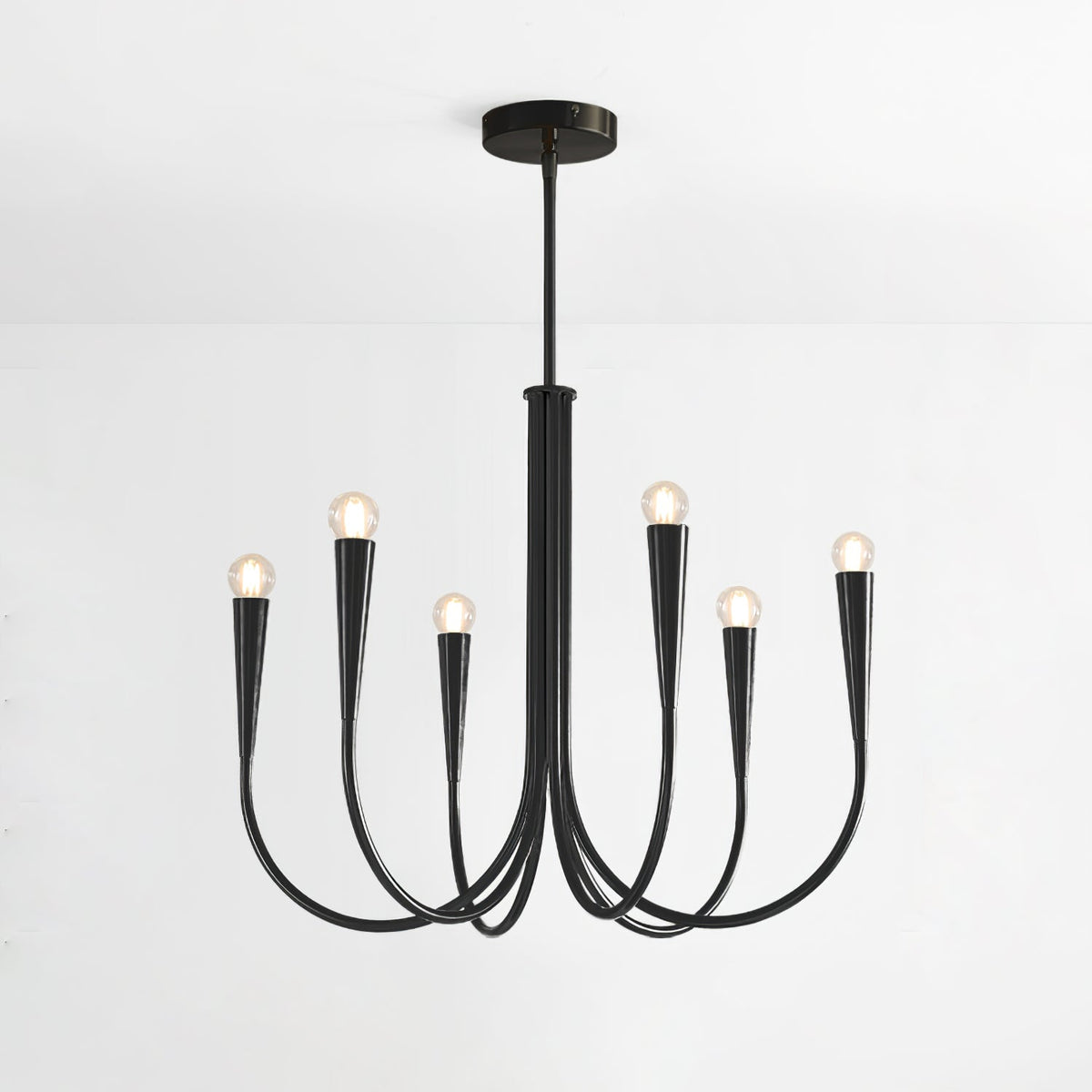 Front view of a black single-tier Clérachic chandelier, with six curved arms and conical sockets, on a pale backdrop.