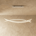 Clérachic long LED chandelier in a longer length, its crossing curved light bars glowing below a slim rectangular canopy.
