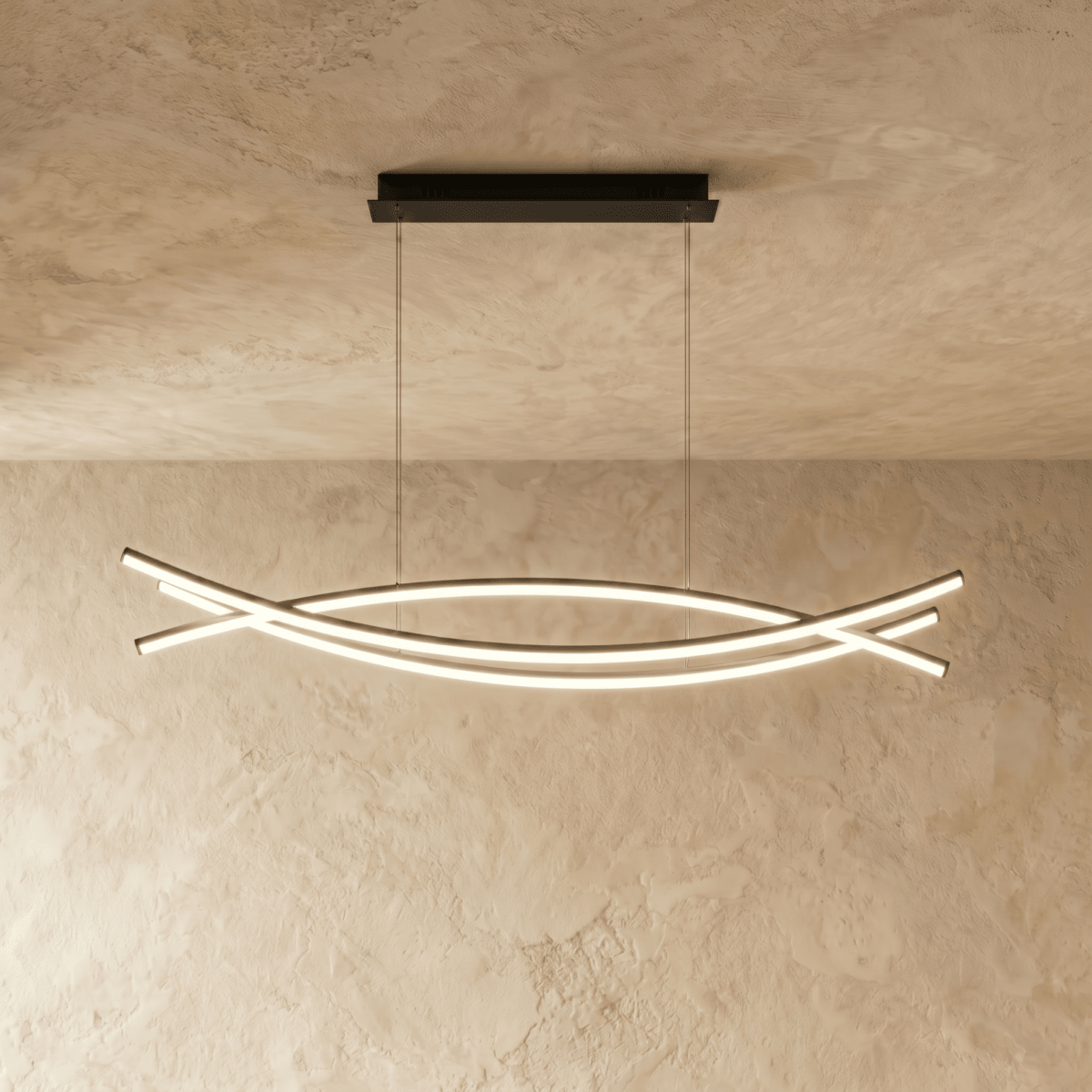 Clérachic long black LED chandelier with crossing curved light bars, hung from a black rectangular canopy on a limewash ceiling.