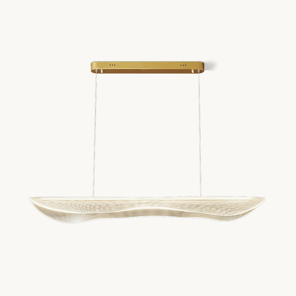 Clérachic linear pendant light with a rippled clear acrylic shade hung on two thin cables from a slim gold canopy, on a white backdrop.