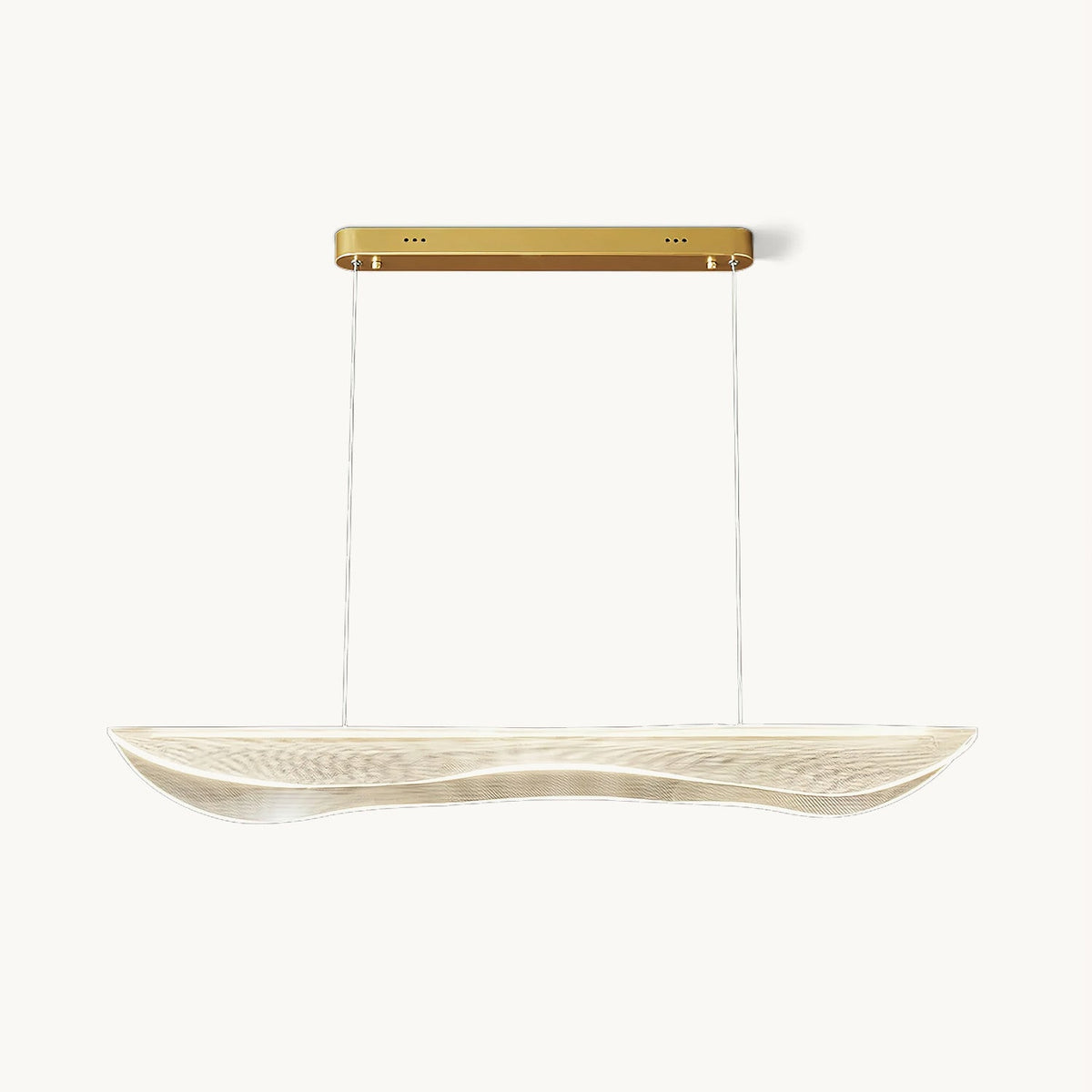 Clérachic linear pendant light with a rippled clear acrylic shade hung on two thin cables from a slim gold canopy, on a white backdrop.