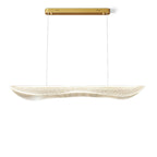 Clérachic linear pendant light with a clear rippled acrylic shade on two thin cables from a gold bar canopy, shown on white.