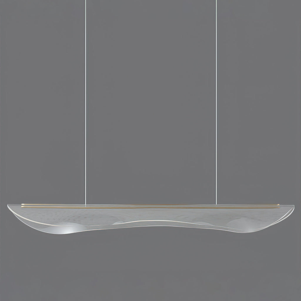 Clérachic linear pendant light in clear acrylic with a thin gold edge strip, hanging on two cables against a grey backdrop.