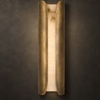Brass Clérachic wall sconce at the longer size, with warm veined alabaster glowing between two curved metal panels.