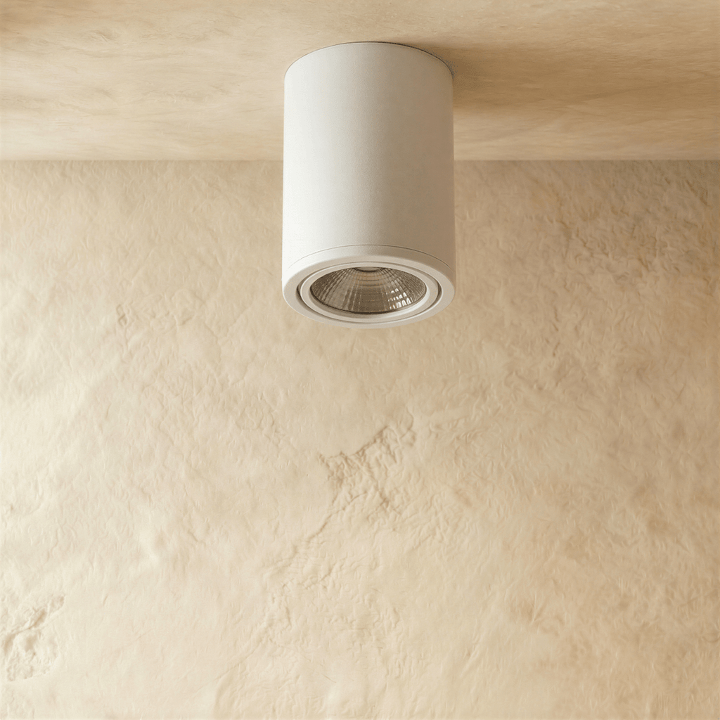 Clérachic white aluminium cylinder downlight, switched off, showing its ribbed reflector and slim trim ring on a ceiling.