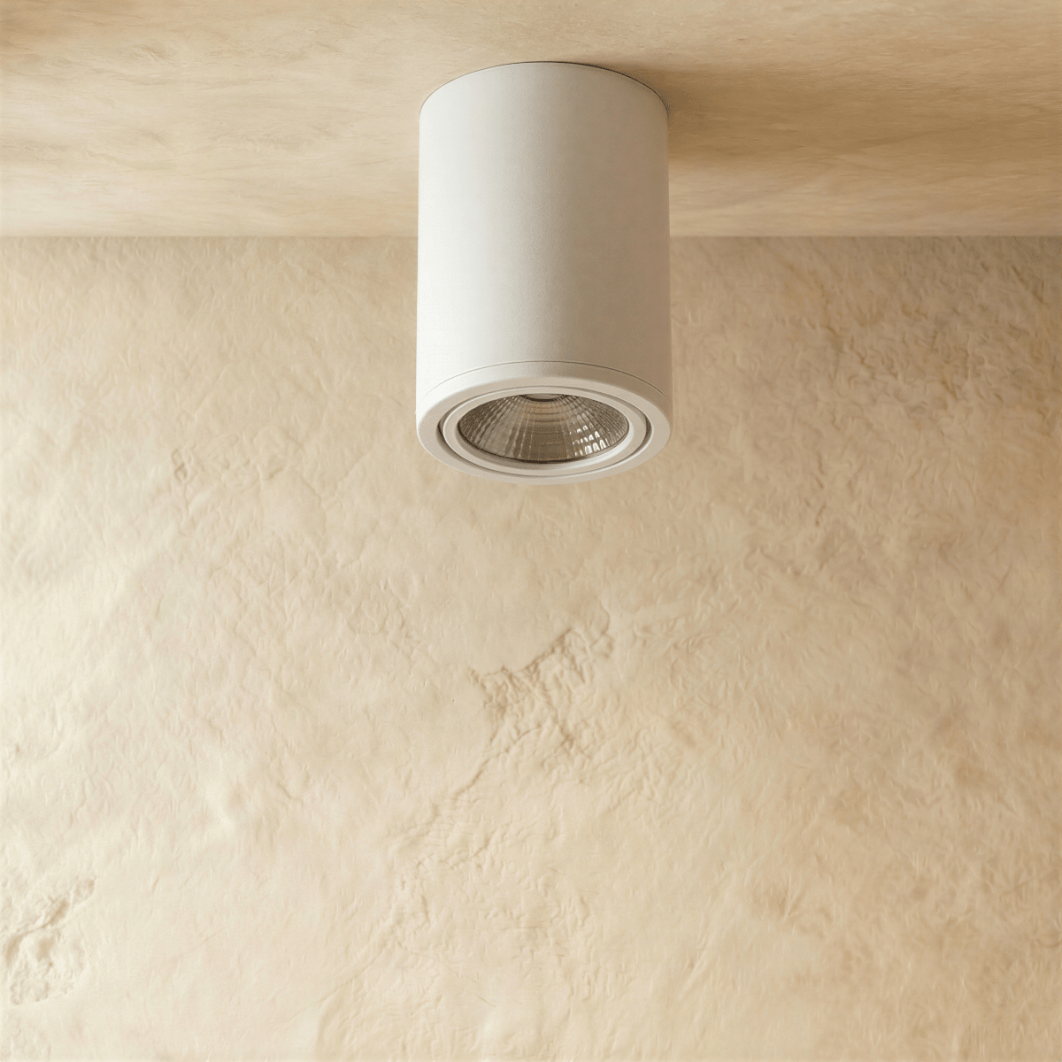 Clérachic white aluminium cylinder downlight, switched off, showing its ribbed reflector and slim trim ring on a ceiling.