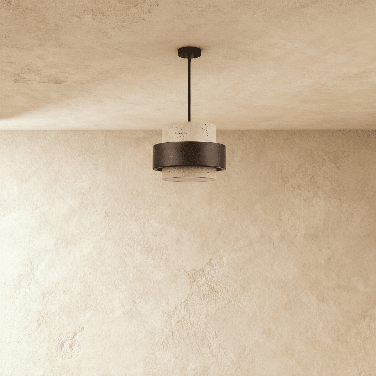 Clérachic travertine drum pendant with a dark wood band, switched off and hung from a black rod over a textured plaster wall.