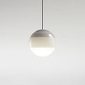 Clérachic dipped gradient glass pendant light in warm grey, the tinted crown fading into an opal white base on a slim black cord.