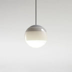 Clérachic dipped gradient glass pendant light in warm grey, the tinted crown fading into an opal white base on a slim black cord.