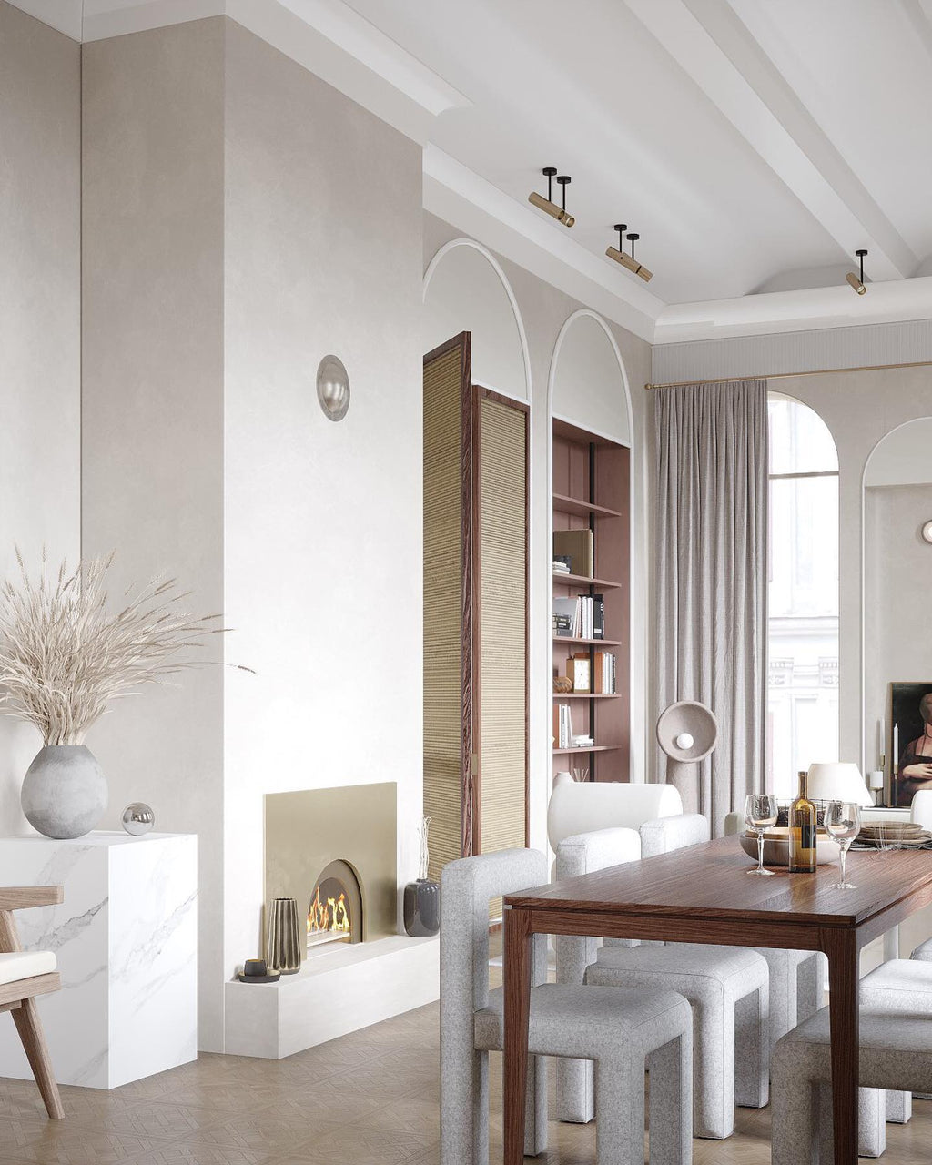 White Clérachic floor lamp in a dining and living space with arched windows, a wooden table and grey stools.