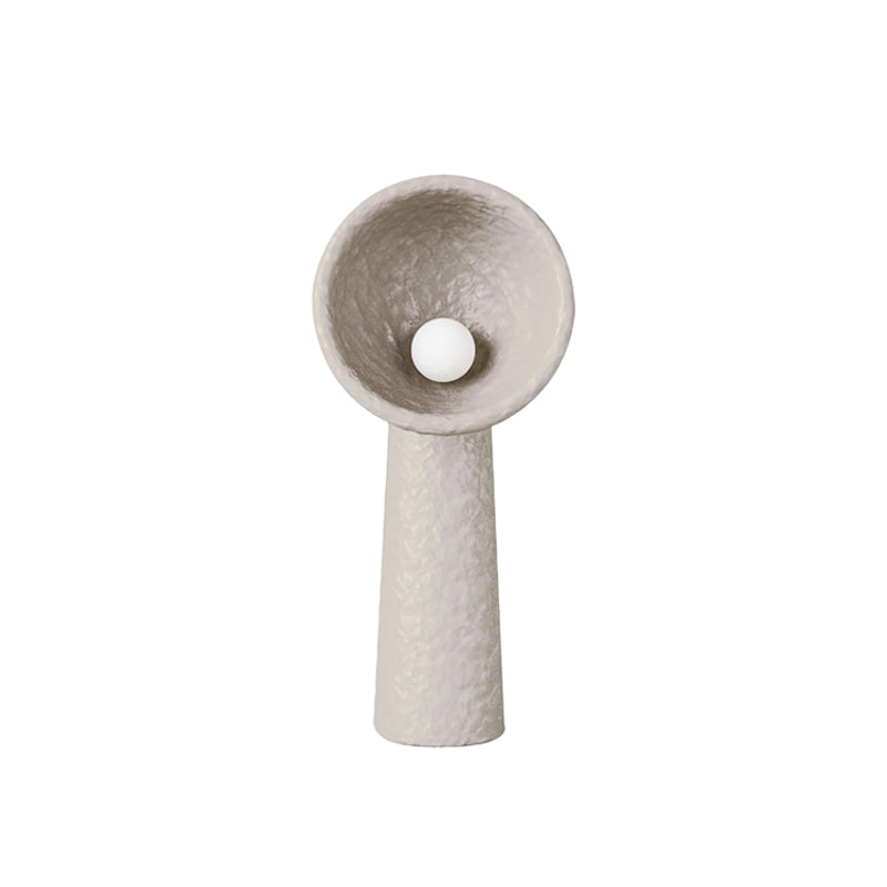 Wider-bowl Clérachic floor lamp in a taupe tone, with a short tapering stem and a round white bulb, on white.