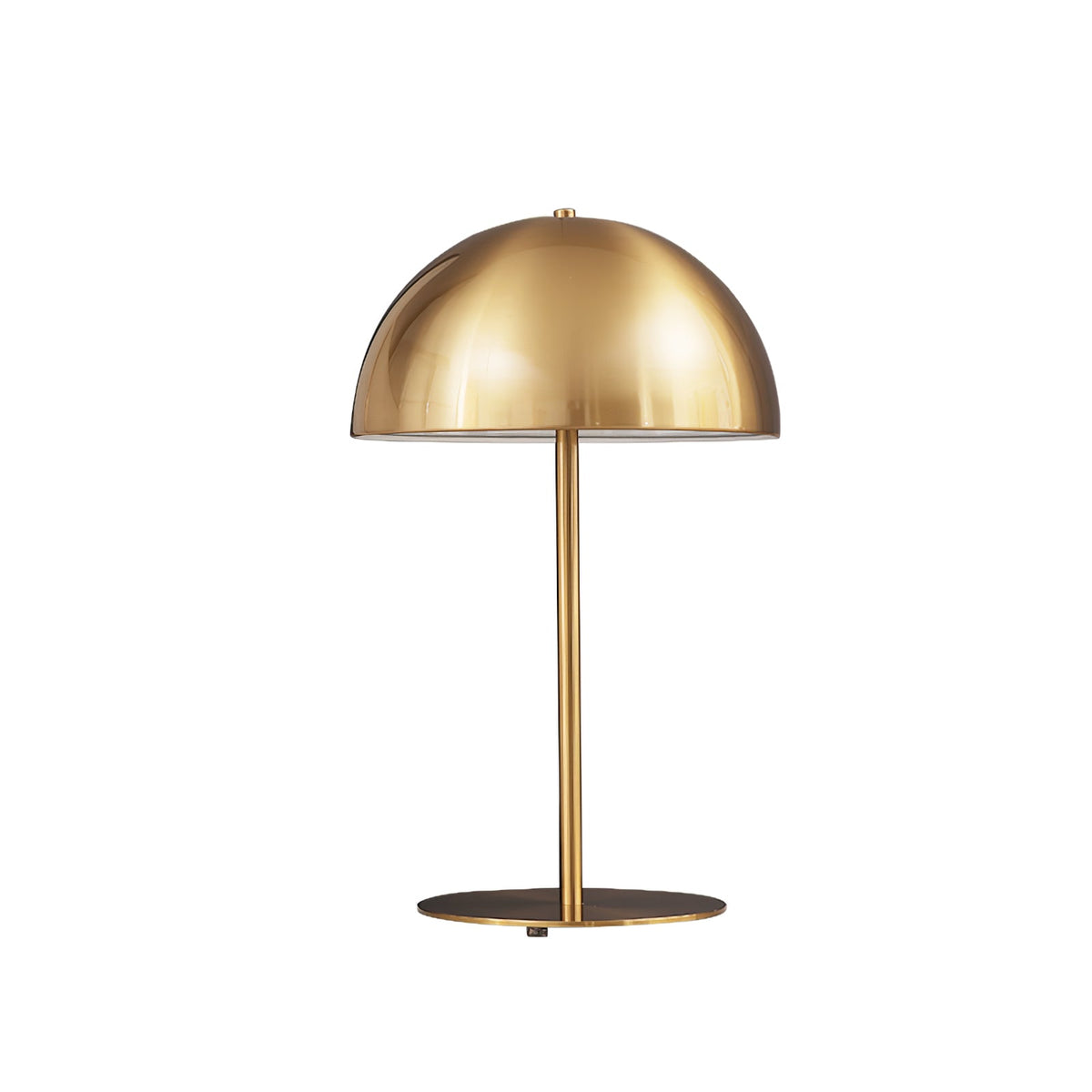 Gold dome table lamp from Clérachic with a polished brass shade and stem, on a plain white background.