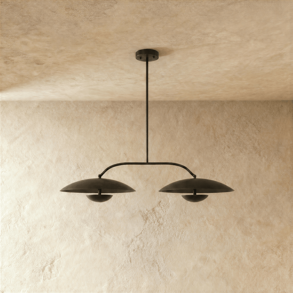 Clérachic chandelier in matte black, close view of the paired dome shades and slender crossbar.