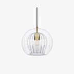 The Clérachic double-wall globe pendant shot straight on in white studio light, brass stem and lampholder visible inside the clear glass.
