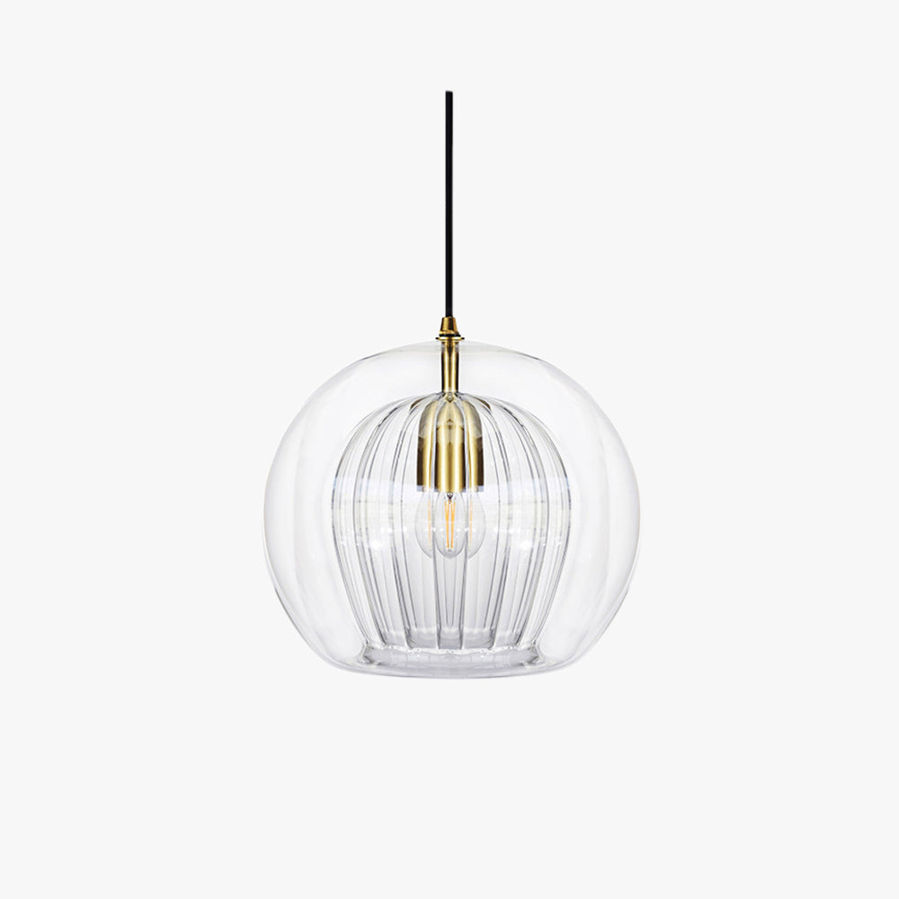 The Clérachic double-wall globe pendant shot straight on in white studio light, brass stem and lampholder visible inside the clear glass.