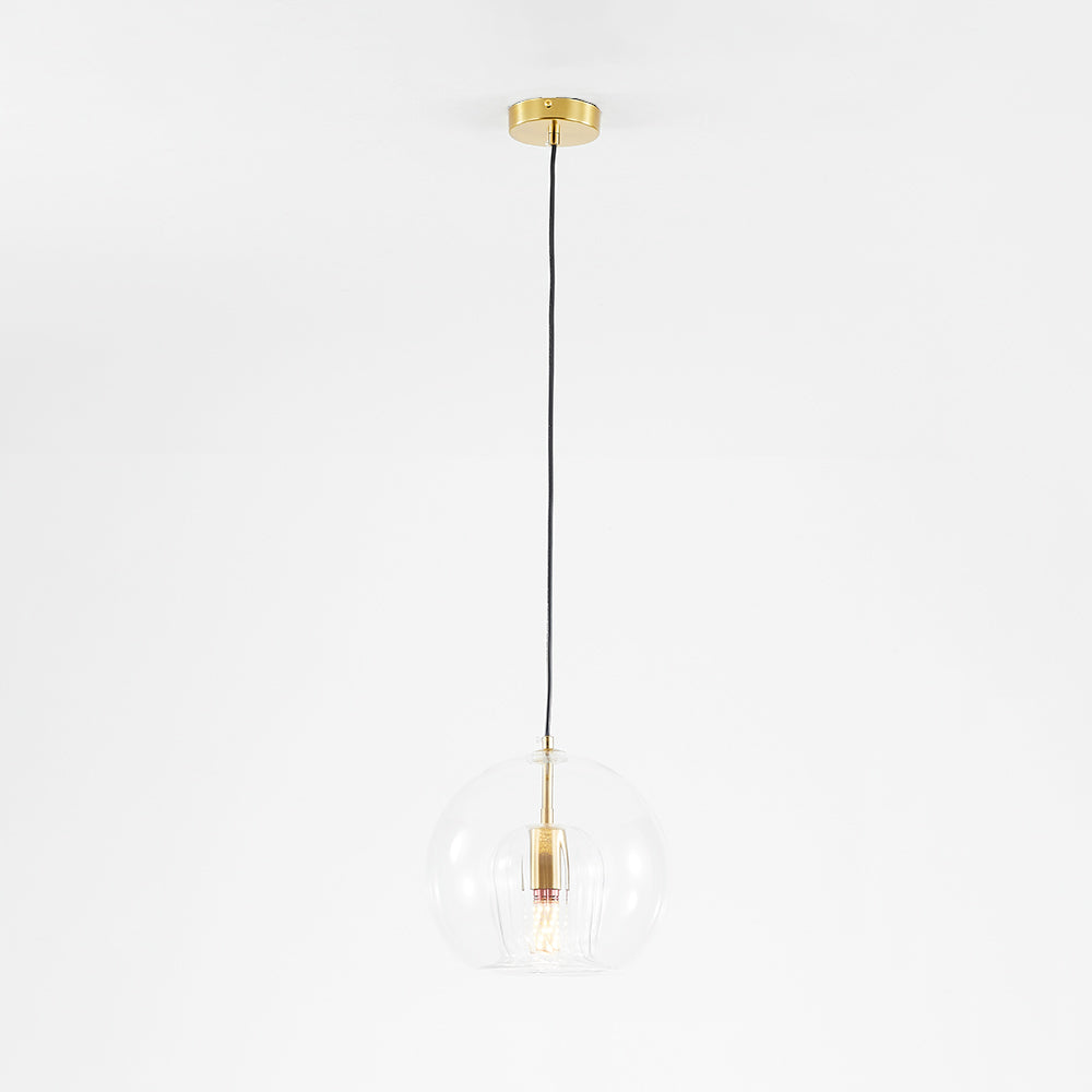 Full-drop studio shot of the Clérachic double-wall globe pendant, brushed brass canopy and long black cord above the clear globe.