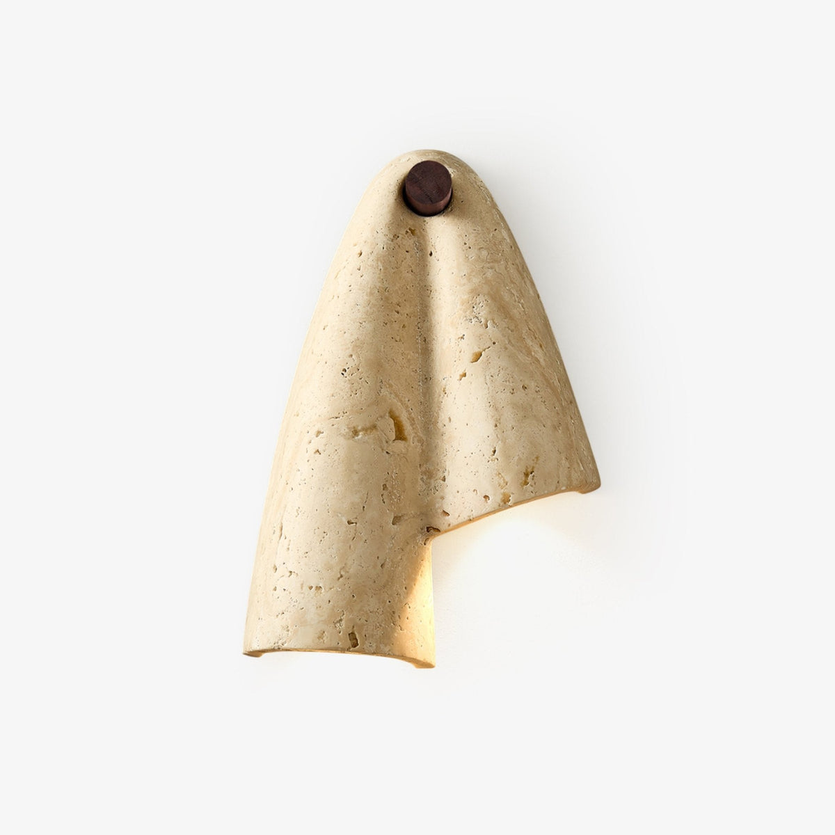 Unlit Clérachic travertine sconce cut out on a white ground, its single fold draping from the wood knob.
