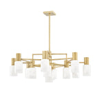 The Clérachic chandelier in brass shown from a low angle, tiered alabaster shades spreading across the frame.