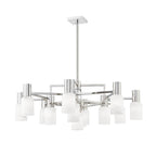 The Clérachic chandelier in chrome at an angle, mirrored rods catching light beside the pale stone shades.