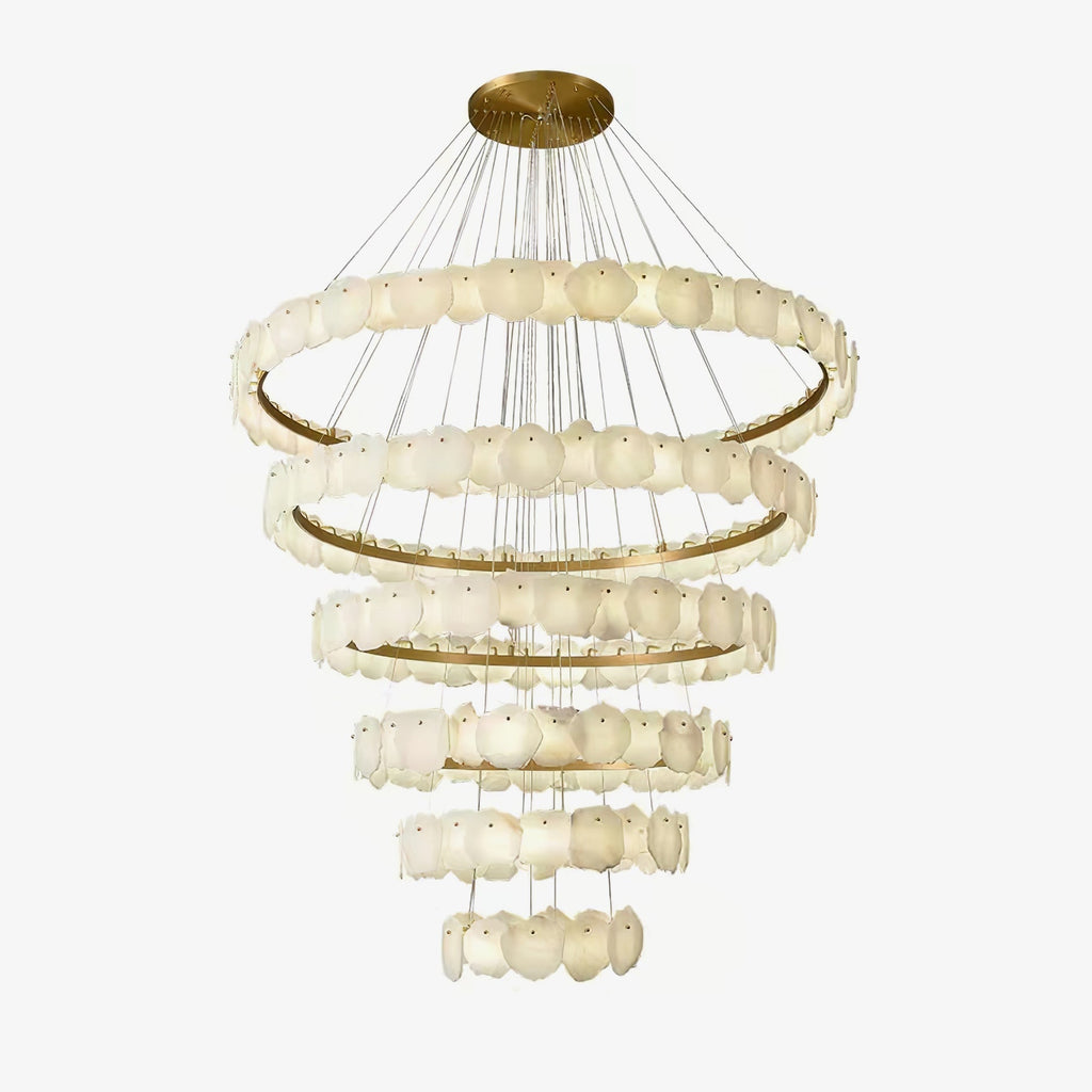 Clérachic Ecliptica chandelier on white, cascading brass tiers strung on fine clear cables.