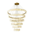Tall version of the Clérachic Ecliptica chandelier on white, stone tiers stretched down its cables.