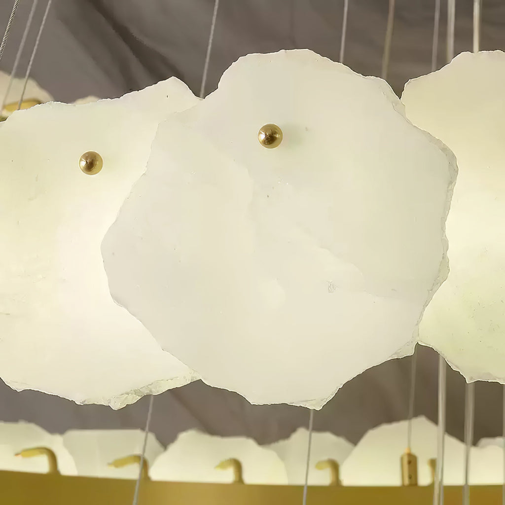 Close detail of the Clérachic Ecliptica petals, brass pins holding each translucent stone disc.
