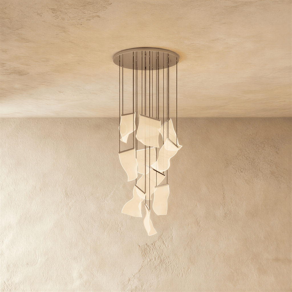 Clérachic iridium silver chandelier with a polished round ceiling plate and glowing wavy acrylic sheet pendants.