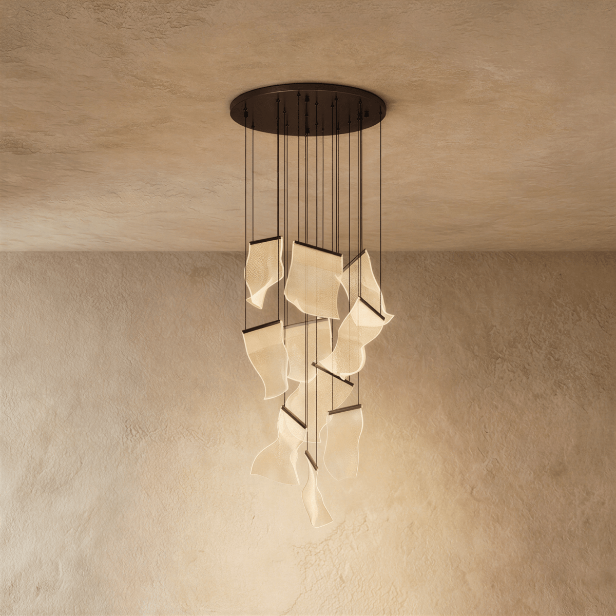Clérachic brilliant black chandelier with textured acrylic panes glowing warmly beneath a dark ceiling plate.